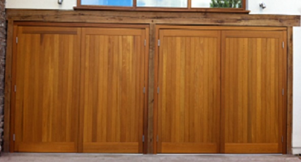 Picture of pairs of Cedar Door side hinged garage doors installed in Exeter